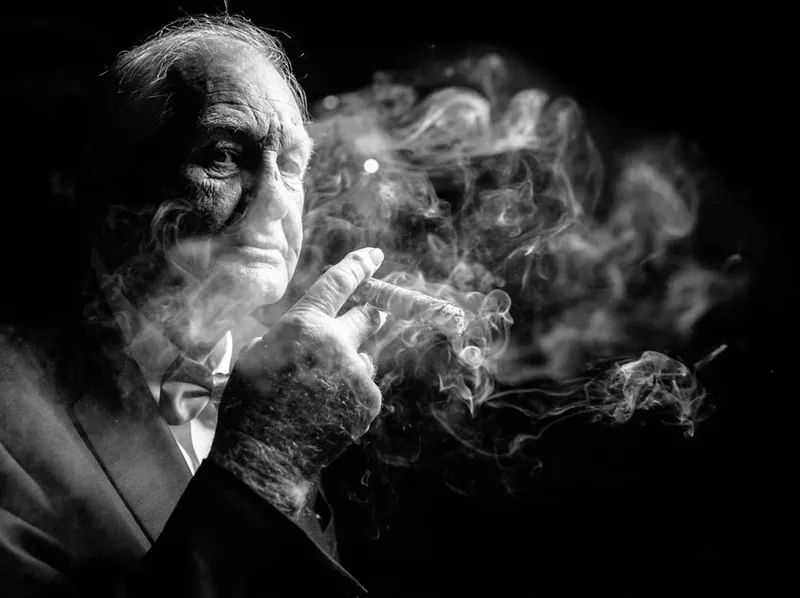 Black and white portrait in cigar smoke